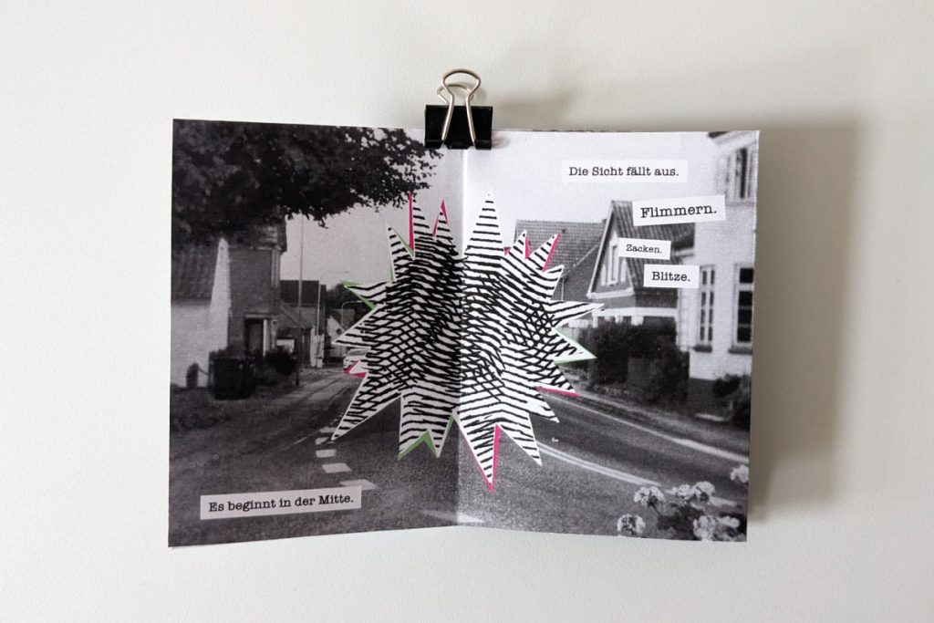 Geöffnetes Zine: Schwarz-Weiß-Fotografie einer Dorfstraße. Kreisförmige Illustration mit schwarzen Wellenlinien und neonfarbenen Rändern in der Mitte, die das Sichtfeld stört.