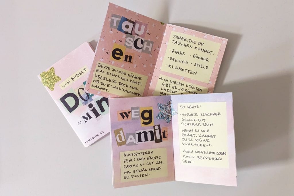 Geöffnete „Low Budget Dopamin“ Zines mit den Collagen Überschriften „Tauschen“ und „Weg damit“ sowie handgeschriebenen Tipps.